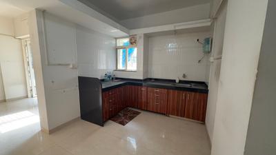 Kitchen Image of 670 Sq.ft 1.5 BHK Apartment / Flat for sale in Mathura Apartments, Kothrud Pune for Rs. 10000000