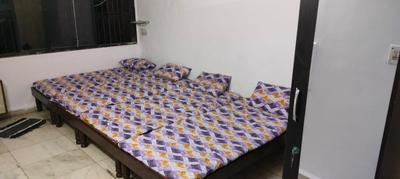 Bedroom Image of Dwarikadhish PG  in Navrangpura, Ahmedabad
