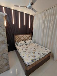 Bedroom Image of 600 Sq.ft 1 BHK Apartment / Flat for sale in MS Vrindavan City Building A And B, Ambivli Thane for Rs. 2999000