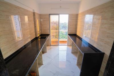 Kitchen Image of 1038 Sq.ft 2 BHK Apartment / Flat for sale in Kalyan West Kalyan for Rs. 7400000