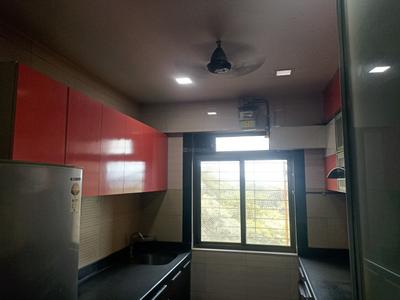 Kitchen Image of 650 Sq.ft 2 BHK Apartment / Flat for rent in Lodha Splendora, Kasarvadavali Thane for Rs. 35000