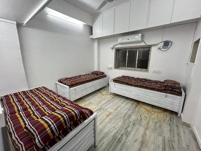 Bedroom Image of Rassiwala Paying Guest Churchgate in Churchgate, Mumbai