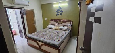 Bedroom Image of 927 Sq.ft 2 BHK Apartment / Flat for sale in Sahjanand City, Kudasan Gandhinagar for Rs. 6500000