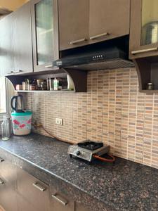 Kitchen Image of 1600 Sq.ft 3 BHK Apartment / Flat for rent in Grand Omaxe, Sector 93B Noida for Rs. 43900