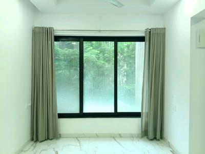 Living Room Image of 650 Sq.ft 1 BHK Apartment / Flat for sale in Kanungo Pinnacolo, Mira Road East Mira Bhayandar for Rs. 8000000