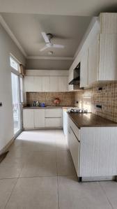 Kitchen Image of 1093 Sq.ft 2.5 BHK Builder Floor for rent in Central Park Flower Valley, Sector 33 Sohna for Rs. 29000