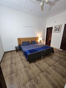 Bedroom Image of Apno Ghar PG in Sector 52, Gurgaon