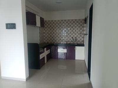 Kitchen Image of 950 Sq.ft 1 BHK Apartment / Flat for rent in Nirman Silver Mist, Lohegaon Pune for Rs. 26000