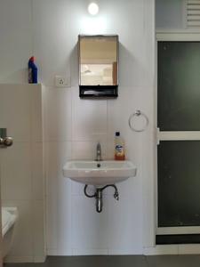 Common Bathroom Image of 663 Sq.ft 2 BHK Apartment / Flat for rent in The Atmosphere O2, Mulund West Mumbai for Rs. 62000