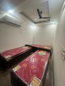 Bedroom Image of HOUSITIZE PG  in Sector 27, Noida