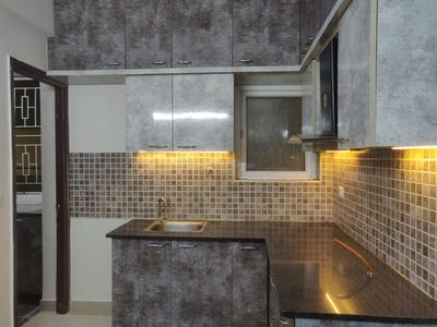 Kitchen Image of 974 Sq.ft 2 BHK Apartment / Flat for rent in SJR Parkway Homes, Rayasandra Bengaluru for Rs. 30000