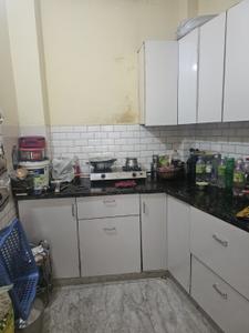 Kitchen Image of 900 Sq.ft 2.5 BHK Builder Floor for sale in Ramesh Nagar New Delhi for Rs. 6900000