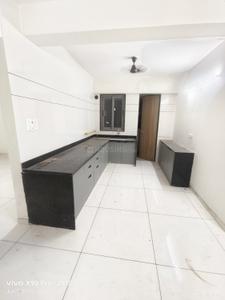 Kitchen Image of 950 Sq.ft 3 BHK Apartment / Flat for rent in Swastik Highlands, Dharam Nagar Rajkot for Rs. 21000