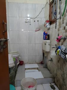 Common Bathroom Image of 680 Sq.ft 2 BHK Apartment / Flat for sale in Sangam Vihar New Delhi for Rs. 3200000