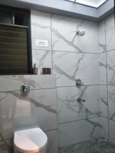Common Bathroom Image of 1488 Sq.ft 3 BHK Apartment / Flat for sale in Punawale Pune for Rs. 13000000