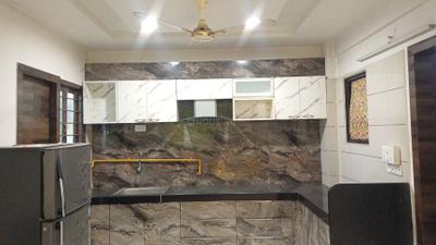 Kitchen Image of 2115 Sq.ft 3 BHK Apartment / Flat for rent in Devnandan Heights, Chandkheda Ahmedabad for Rs. 40000