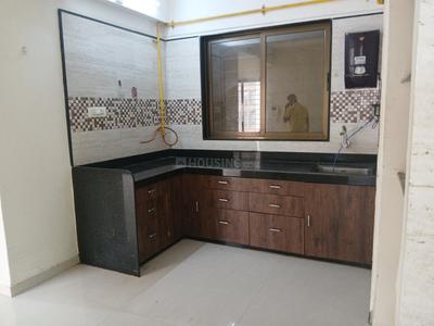 Kitchen Image of 1180 Sq.ft 2 BHK Apartment / Flat for rent in Universal Bilvam Paradise, Pal Gam Surat for Rs. 18500