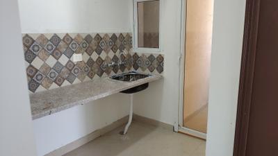 Kitchen Image of 950 Sq.ft 2 BHK Apartment / Flat for rent in Signature Global Proxima 1, Sector 89 Gurgaon for Rs. 15000