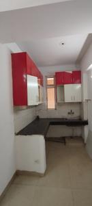 Kitchen Image of 750 Sq.ft 2 BHK Apartment / Flat for sale in Ajnara Homes, Noida Extension Greater Noida for Rs. 7950000
