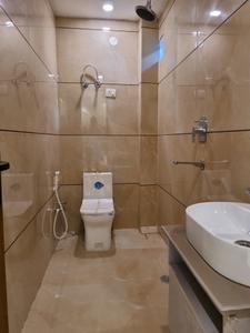 Common Bathroom Image of 1000 Sq.ft 3 BHK Apartment / Flat for sale in Hans Luxury Floor, Hastsal New Delhi for Rs. 6200000