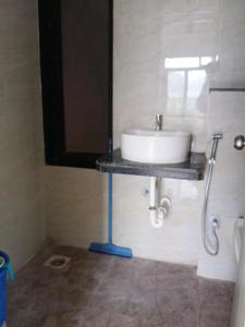 Common Bathroom Image of 1020 Sq.ft 2 BHK Apartment / Flat for sale in MICL Aaradhya Highpark Project 2 Of Phase I, Mira Road East Mira Bhayandar for Rs. 12800000