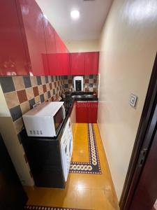 Kitchen Image of 550 Sq.ft 1 BHK Apartment / Flat for rent in Sernabatim Goa for Rs. 25000