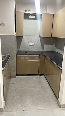 Kitchen Image of 990 Sq.ft 3 BHK Apartment / Flat for sale in Rajpur Khurd Extension New Delhi for Rs. 7000000