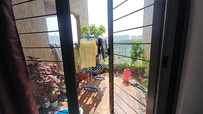 Balcony Image of 900 Sq.ft 2 BHK Apartment / Flat for sale in Ahura Ecopolitan, Tathawade Pune for Rs. 7200000