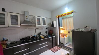 Kitchen Image of 1100 Sq.ft 2 BHK Apartment / Flat for sale in Pride Kingsbury Phase I, Charholi Budruk Pune for Rs. 8200000