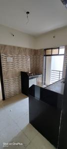 Kitchen Image of 550 Sq.ft 1 BHK Apartment / Flat for sale in Nine Star Landmark Ph II Bldg 7 Daisy, Makane Kapase Mumbai for Rs. 2200000