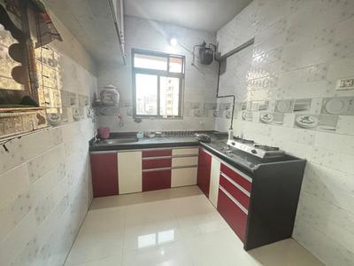 Kitchen Image of 690 Sq.ft 1 BHK Apartment / Flat for sale in Kulswamini Srushti Residency D Type Wing 3, Dombivli East Thane for Rs. 4600000