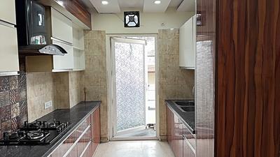 Kitchen Image of 1350 Sq.ft 3 BHK Builder Floor for rent in Tagore Garden Extension New Delhi for Rs. 46000