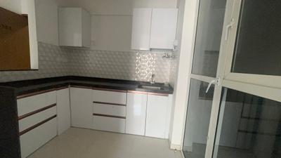 Kitchen Image of 950 Sq.ft 2 BHK Apartment / Flat for rent in Manjari Khurd Pune for Rs. 24000