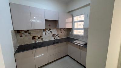 Kitchen Image of 1000 Sq.ft 2 BHK Apartment / Flat for sale in Amrapali Verona Heights, Noida Extension Greater Noida for Rs. 7640000
