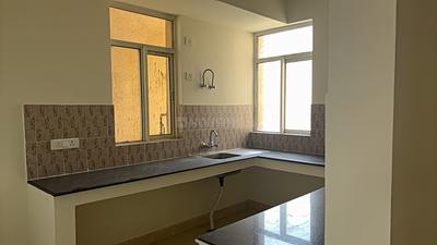 Kitchen Image of 2026 Sq.ft 4 BHK Apartment / Flat for sale in Rising Homes At DXP 92, Sector 92 Gurgaon for Rs. 18500000