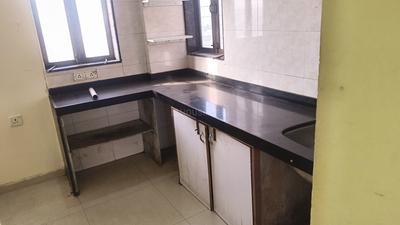 Kitchen Image of 931 Sq.ft 2 BHK Apartment / Flat for sale in Swaraj Planet, Kopar Khairane Navi Mumbai for Rs. 13500000