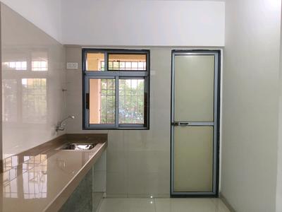 Kitchen Image of 551 Sq.ft 1 BHK Apartment / Flat for sale in Cosmos Meluha, Khidkali Thane for Rs. 4350000