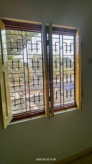 Sri Krishna Apartment Bedroom 1