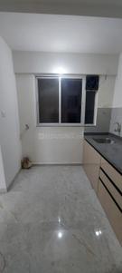 Kitchen Image of 1001 Sq.ft 2 BHK Apartment / Flat for rent in Sah Santiago Uptown, Kiwale Pune for Rs. 23000