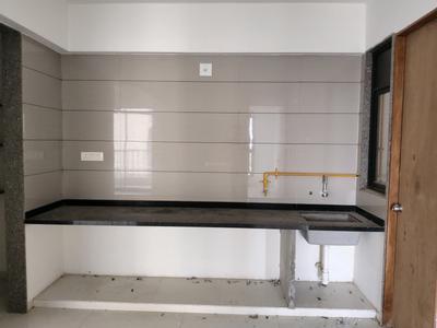 Kitchen Image of 1764 Sq.ft 3 BHK Apartment / Flat for sale in Shambhavi Swam Sky by Shambhavi Corporation	, Ognaj Ahmedabad for Rs. 9000000