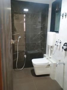 Common Bathroom Image of 710 Sq.ft 1 BHK Apartment / Flat for sale in Tharwani Vedant Millenia Happiness, Titwala Thane for Rs. 2600000