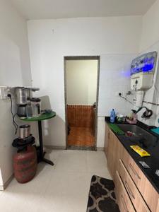 Kitchen Image of 1550 Sq.ft 3 BHK Apartment / Flat for sale in Axis Whistling Meadows, Bhugaon Pune for Rs. 12500000