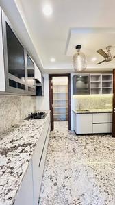 Kitchen Image of 1850 Sq.ft 3 BHK Builder Floor for rent in Kirti Nagar New Delhi for Rs. 65000