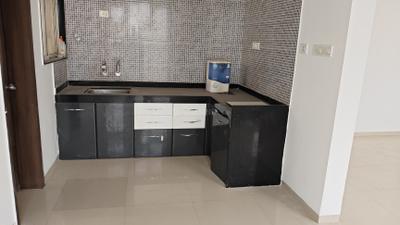Kitchen Image of 1020 Sq.ft 2 BHK Apartment / Flat for sale in Gagan Micasaa, Wagholi Pune for Rs. 5350000