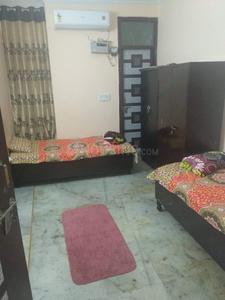 Bedroom Image of Neeru pg in Janakpuri, New Delhi