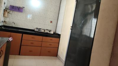 Kitchen Image of 855 Sq.ft 2 BHK Apartment / Flat for rent in Vasant Sagar Saraswati Complex, Kandivali East Mumbai for Rs. 55000
