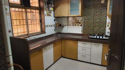 Kitchen Image of 880 Sq.ft 2 BHK Apartment / Flat for sale in Sai Mangal Apartment, Kandivali West Mumbai for Rs. 14200000
