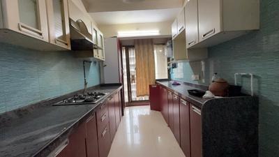 Kitchen Image of 1150 Sq.ft 2 BHK Apartment / Flat for sale in Tharwani Rosewood Heights, Kharghar Navi Mumbai for Rs. 18500000