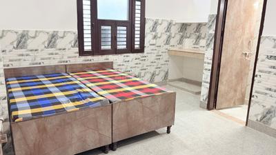 Bedroom Image of Ankit pg in Sector 45, Noida