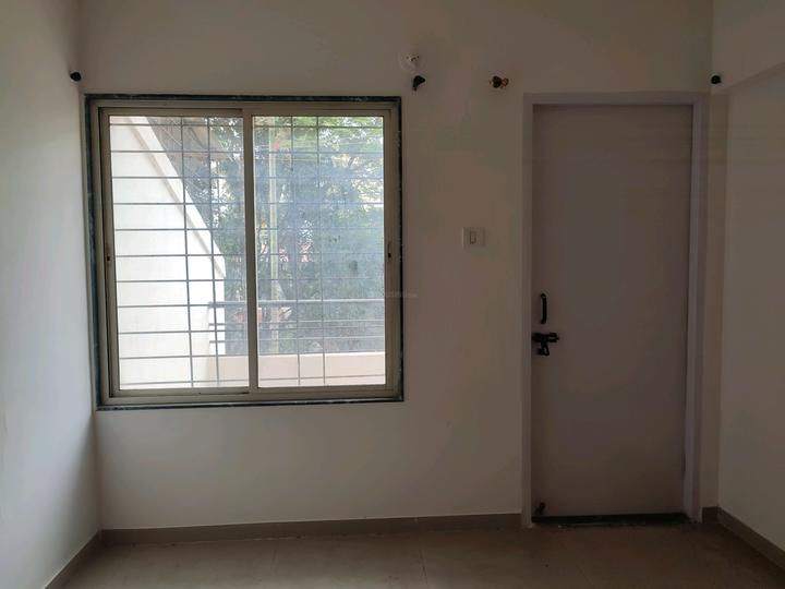 Atharva Apartment Bedroom 1